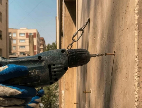 نصب پیچ و رولپلاک نمای ساختمان